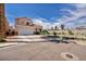 Charming two-story home with a two car garage and a well-manicured lawn and driveway at 103 Trout Creek Ct, Las Vegas, NV 89123