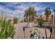 Landscaped front yard featuring a stone pathway and decorative elements, perfect for a welcoming aesthetic at 103 Trout Creek Ct, Las Vegas, NV 89123