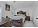 Elegant main bedroom featuring a large bed, decorative furniture, and marble floors at 103 Trout Creek Ct, Las Vegas, NV 89123
