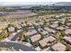 Aerial view of the well-maintained residential neighborhood, showcasing desert landscaping and neat rows of houses at 10601 India Hawthorn Ave, Las Vegas, NV 89144