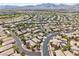 Extensive neighborhood featuring meticulously planned streets, manicured landscapes, and diverse architectural home designs at 10601 India Hawthorn Ave, Las Vegas, NV 89144