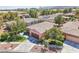 Single-Gathering home with attached garage, landscaped yard, and well-maintained exterior, in a residential setting at 10601 India Hawthorn Ave, Las Vegas, NV 89144
