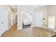 Bright bedroom with tile floors, white walls, and ample closet space at 10601 India Hawthorn Ave, Las Vegas, NV 89144