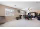 Spacious bonus room is perfect for games and entertaining; shutters and neutral walls at 11219 Castellane Dr, Las Vegas, NV 89141