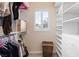 Walk-in closet with built-in shelving, offering ample storage and organization options at 11219 Castellane Dr, Las Vegas, NV 89141