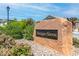 Montagne Marron community entrance sign surrounded by landscaped shrubbery at 11219 Castellane Dr, Las Vegas, NV 89141