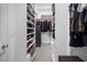 This walk-in closet boasts ample shelving and hanging space for optimal organization at 11219 Castellane Dr, Las Vegas, NV 89141
