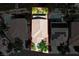 Aerial view showcases the property boundaries, offering a view of the backyard pool and surrounding landscaping at 11618 Costa Linda Ave, Las Vegas, NV 89138