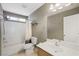 Clean bathroom featuring a shower-tub combo, vanity, and tile flooring at 11618 Costa Linda Ave, Las Vegas, NV 89138