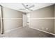 Bedroom featuring neutral paint, carpeted floors, and an ensuite bathroom at 11618 Costa Linda Ave, Las Vegas, NV 89138