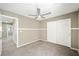 Bright bedroom with carpeted floors, and a double door closet at 11618 Costa Linda Ave, Las Vegas, NV 89138