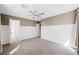 Bright bedroom featuring neutral paint, white wainscoting, and a ceiling fan at 11618 Costa Linda Ave, Las Vegas, NV 89138