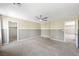 Spacious bedroom with neutral walls, plush carpet, and natural light at 11618 Costa Linda Ave, Las Vegas, NV 89138