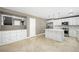 Stylish open-concept kitchen with a large island and stainless steel appliances at 11618 Costa Linda Ave, Las Vegas, NV 89138