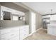 Bright kitchen with a stainless steel refrigerator and tile flooring at 11618 Costa Linda Ave, Las Vegas, NV 89138