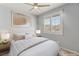 Serene bedroom with a plush bed, natural light, and stylish decor at 11784 Golden Moments Ave, Las Vegas, NV 89138