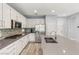 Well-equipped kitchen with granite countertops, stainless steel appliances, and ample cabinet space at 11784 Golden Moments Ave, Las Vegas, NV 89138