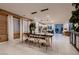 Spacious dining room with modern lighting and stylish decor, ideal for Gathering gatherings at 12053 Arrebol Ave, Las Vegas, NV 89138