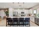 Modern kitchen with an island and sleek stainless steel appliances at 12053 Arrebol Ave, Las Vegas, NV 89138