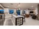 Open concept features the kitchen, living room and dining area at 12053 Arrebol Ave, Las Vegas, NV 89138