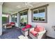 Inviting covered patio with stylish furniture, perfect for outdoor relaxation and entertaining at 12053 Arrebol Ave, Las Vegas, NV 89138