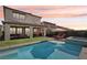 Backyard pool with cozy outdoor seating, a built-in spa, and patio space perfect for relaxing at 12053 Arrebol Ave, Las Vegas, NV 89138