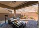 Inviting back patio with comfortable seating, perfect for relaxing and entertaining outdoors with scenic views at 12843 New Providence St, Las Vegas, NV 89141