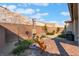 Picturesque backyard featuring desert landscaping, creating a tranquil oasis with stunning mountain views at 12843 New Providence St, Las Vegas, NV 89141