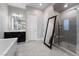 The primary bathroom features a glass enclosed shower and soaking tub at 12843 New Providence St, Las Vegas, NV 89141