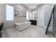 This bathroom features a soaking tub and a tile floor at 12843 New Providence St, Las Vegas, NV 89141