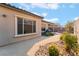 Exterior view showcasing desert landscaping, patio and views of a beautiful mountain at 12843 New Providence St, Las Vegas, NV 89141