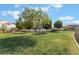 Beautiful green space with mature trees, perfect for picnics and enjoying the outdoors at 12843 New Providence St, Las Vegas, NV 89141