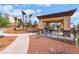 Community playground with modern play equipment and a shaded seating area for parents at 12843 New Providence St, Las Vegas, NV 89141