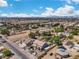 Scenic aerial shot of a residential area, highlighting a home with a pool and established trees at 131 Beesley Dr, Las Vegas, NV 89110