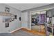 View of bedroom with gray walls, wood floors, and large closet with mirrored sliding doors at 131 Beesley Dr, Las Vegas, NV 89110