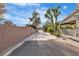 Long driveway leading to a home with a covered patio at 131 Beesley Dr, Las Vegas, NV 89110