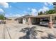 Spacious property with a garage, carport, and ample parking space; ideal for multiple vehicles or projects at 131 Beesley Dr, Las Vegas, NV 89110
