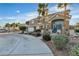 Attractive two-story home with a circular drive and desert landscaping at 131 Beesley Dr, Las Vegas, NV 89110