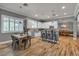 Bright kitchen with stainless steel appliances, island seating, and open to the dining area at 131 Beesley Dr, Las Vegas, NV 89110
