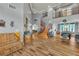 Spacious living room with wood floors and staircase leading to the second floor at 131 Beesley Dr, Las Vegas, NV 89110