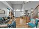 Open-concept living room with high ceilings and wood floors, lots of natural light at 131 Beesley Dr, Las Vegas, NV 89110