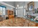 Open-concept living room with natural light, with view of foyer, staircase and wood floors at 131 Beesley Dr, Las Vegas, NV 89110