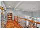 Spacious loft area featuring hardwood floors, natural lighting, and decorative touches at 131 Beesley Dr, Las Vegas, NV 89110