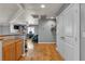 Bright open loft area with hardwood floors, storage, and comfortable seating, perfect for a flexible living space at 131 Beesley Dr, Las Vegas, NV 89110