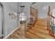 Inviting foyer features a wooden staircase and neutral-toned walls, creating a warm and welcoming entrance at 131 Beesley Dr, Las Vegas, NV 89110