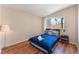 Bedroom with a large window with natural light, carpet floor and furniture at 1615 Palora Ave, Las Vegas, NV 89169