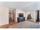 Bright bedroom features wood-look floors, and a mirrored closet that provides ample storage at 1615 Palora Ave, Las Vegas, NV 89169