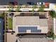 Aerial view of a home with a landscaped backyard, solar panels, and modern design at 169 Volti Subito Way, Henderson, NV 89011