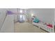 Inviting bedroom with bunk beds, a cozy beanbag chair, and a whimsical decor, perfect for children at 169 Volti Subito Way, Henderson, NV 89011