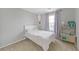 Comfortable bedroom with a twin bed, soft carpet, natural light, and play kitchen at 169 Volti Subito Way, Henderson, NV 89011